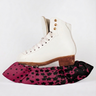 White figure skating boot with a pink and black star-patterned sock on a white background
